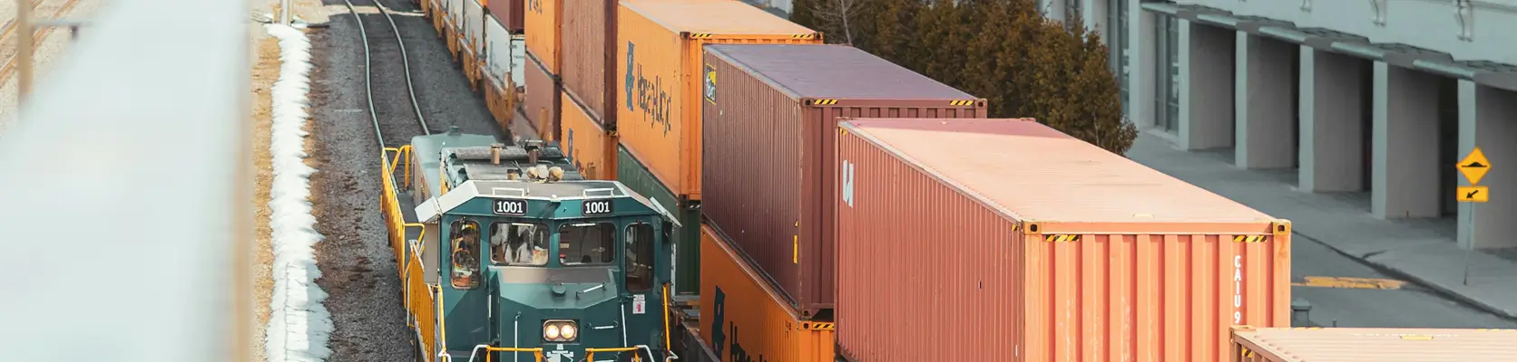 Image of a train as a mode of freight transportation with shipping containers